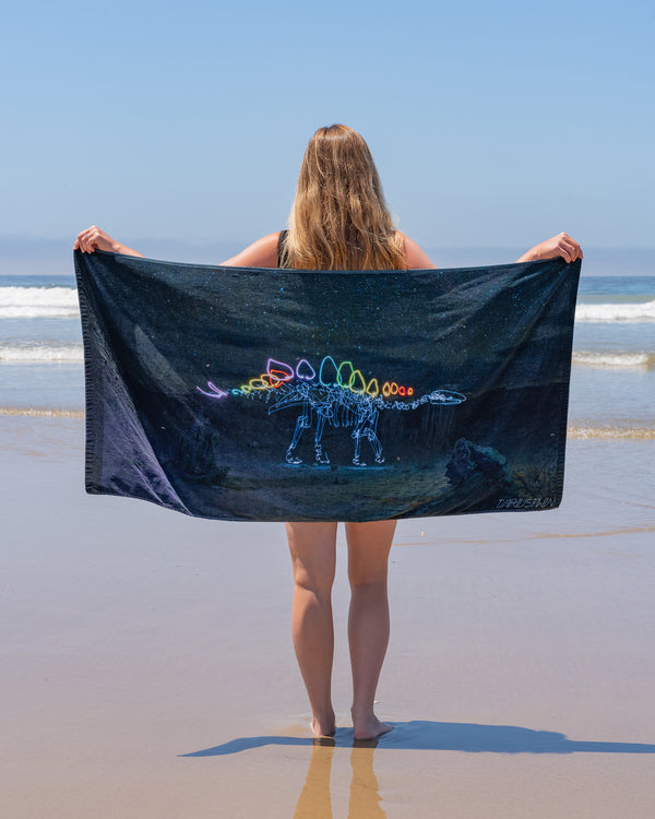 Stegosaurus in Space Beach Towel