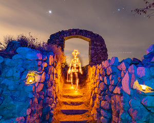 A skeleton miner surrounded by glowing gems created with light painting in this stop-motion fantasy short by Dariustwin.