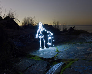 A skeleton skateboarder lighting up the streets at night created with light painting in this stop-motion short by Dariustwin.