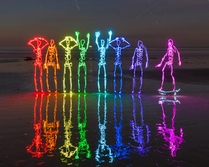 A skeleton skateboarder drawn with light painting performing tricks in this stop-motion short film by Dariustwin.