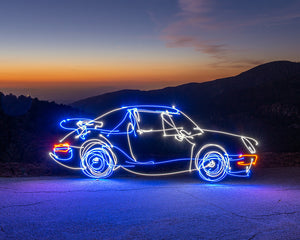 Light painting photography created for Porsche featuring a 1986 Porsche 911 captured in a long-exposure night photo.